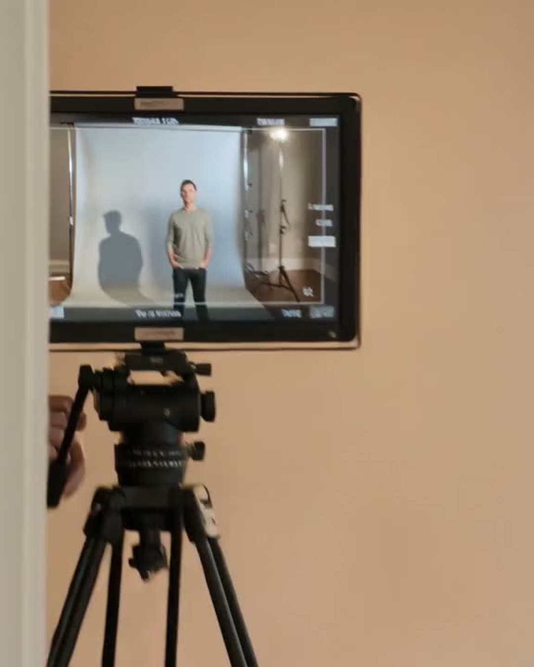 A business owner being filmed on camera during a shooting day in LA